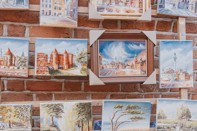 paintings on canvas showing the old town of warsaw in poland so
